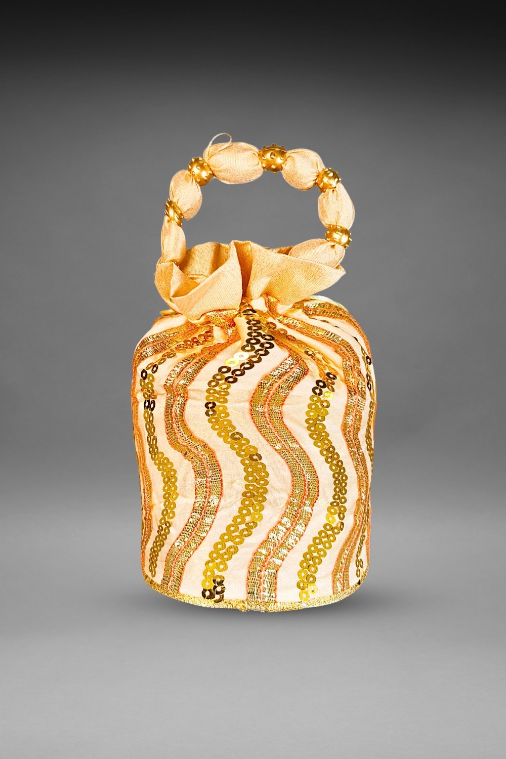 beige sequin potli bag